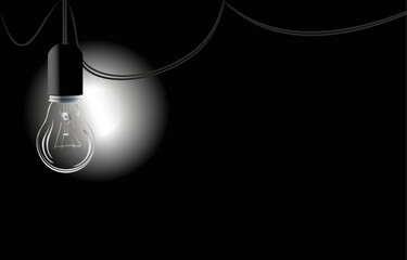 Non-luminous light bulb in a dark room illuminating with the light of a flashlight
