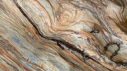 Beach Rock Strata at Castle Beach in Falmouth, Cornwall, UK. Abstract Background. - obrazy, fototapety, plakaty