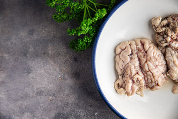 brain pork offal raw meat delicious snack mortadella, pistachios, ham healthy meal food snack diet on the table copy space food background rustic top view 