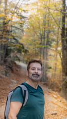 Happy hiker looking at the camera in Montseny Natural Park, Catalonia (Spain).