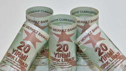Turkish lira photos on a white background. Cylindrical Turkish lira images.