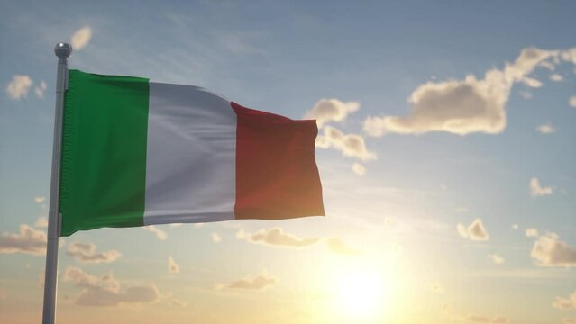 Italy flag on pole waving in the wind sky background. The national flag of Italy