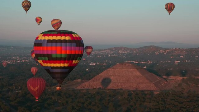 Colorful Hot Air Balloons float over the Pyramid of the Sun in Teotihuacan, Mexico