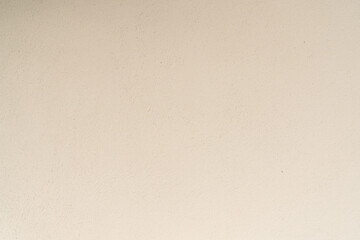 Structural plaster in beige color. Creative vintage background.