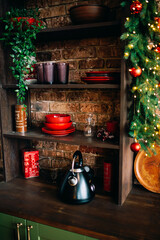 Christmas bright stylish Scandinavian style kitchen. The concept of a decorated cozy home for the holidays.