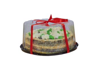 cake packed in a transparent plastic box,round cake in transparent packaging isolated
