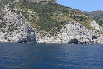 view of the sea and mountains. view of the coast of island. coast of the region. landscape with mountains and sea. landscape with blue sky and clouds. sea and rocks