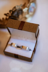 gold wedding rings with a wedding decor
