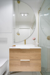 Big semicircle mirror over bathroom washbasin - obrazy, fototapety, plakaty