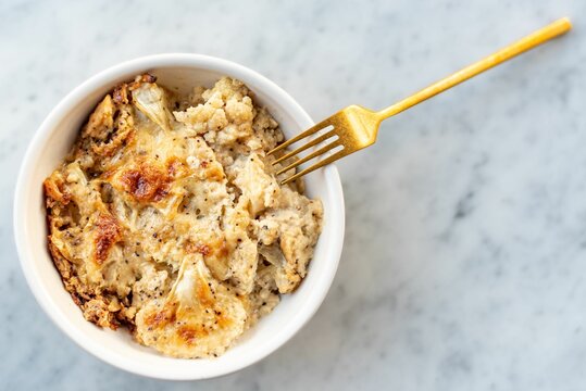 Top View Of A Gourmet Bowl Of Rice And Roasted Cauliflower