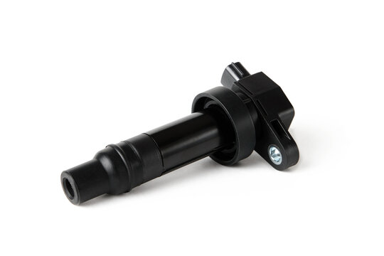 New gasoline engine ignition coil on white isolated background, ignition system spare parts concept.