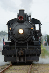 Fototapeta na wymiar Steam Train Engine coming toward camera on Oregon Coast, UsA