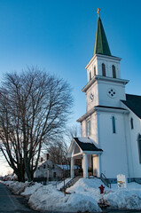 Fototapeta na wymiar Early afternoon church scene in Eastport, Maine