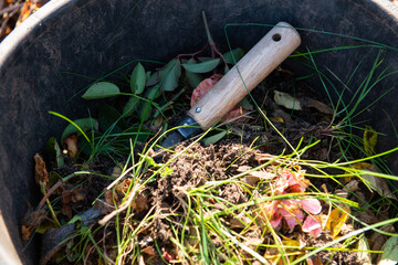 compost in a basket. gardening detail shovel