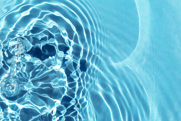 Textured background of rippled water with solar lightning