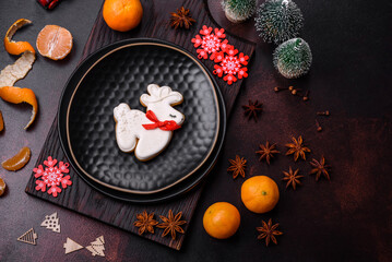 Beautiful Christmas decorations with holiday toys, clementines and gingerbread
