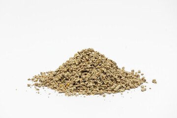 Fraction of feed additives for animals on a white background in the form of a pyramid