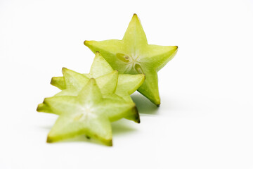 Fototapeta premium star fruit or carambola slices on white background