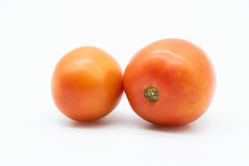 two Tomatoes isolated on white background. organic vegetable
