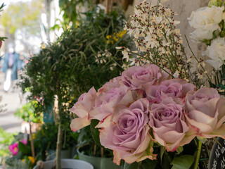 Bouquet of flowers in a flower shop on a street in Paris.