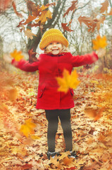 girl in autumn leaves