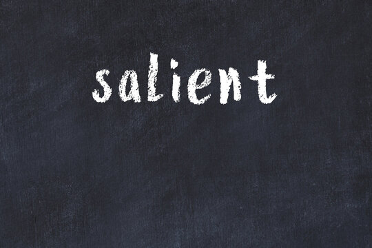 Black chalkboard with inscription salient on in