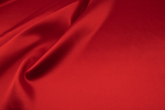 red satin or silk fabric as background