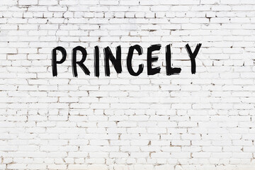 White wall with black paint inscription princely on it - obrazy, fototapety, plakaty