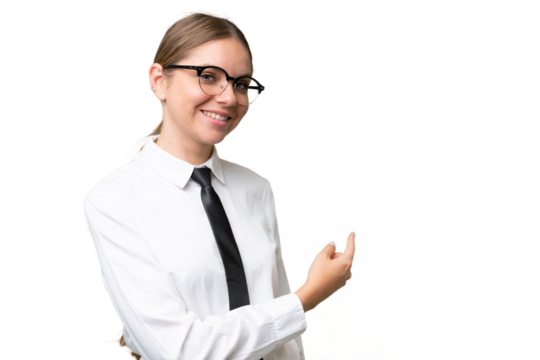 Young business caucasian woman over isolated background pointing back