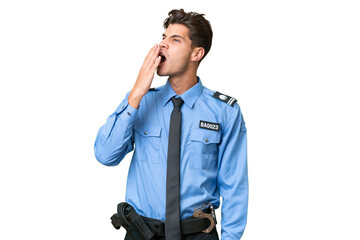 Fototapeta premium Young police man over isolated background yawning and covering wide open mouth with hand