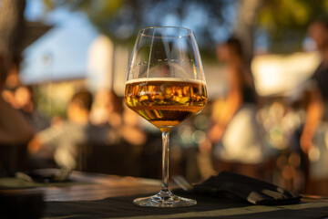 draft beer in wine glass on restaurant table