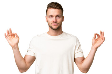 Fototapeta premium Young blonde caucasian man over isolated background in zen pose