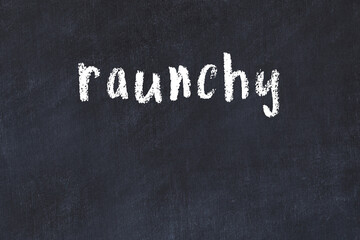 College chalk desk with the word raunchy written on in