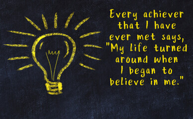Chalk drawing of a bulb and inscription of wise quote