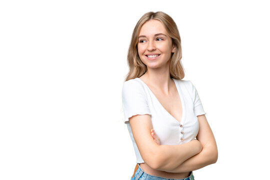 Young English woman over isolated background with arms crossed and happy