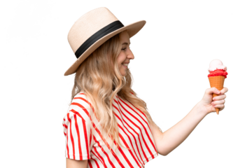 Young English woman with a cornet ice cream over isolated background with happy expression