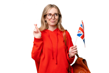 Young hispanic woman holding an United Kingdom flag over isolated background with fingers crossing and wishing the best