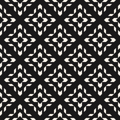 Vector geometric seamless pattern with tribal ethnic motif. Modern folk ornament. Simple abstract black and white texture with grid, floral shapes. Retro vintage style. Monochrome repeat background