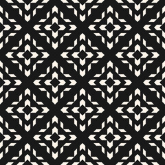 Vector geometric seamless pattern with tribal ethnic motif. Modern folk ornament. Simple abstract black and white texture with grid, floral shapes. Retro vintage style. Monochrome repeat background