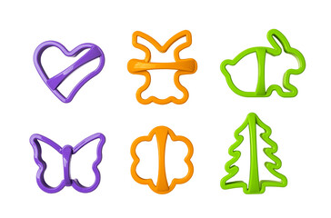 Multicolored cookie cutter set for homemade biscuit cutout. Cookie dough cutters in the shape of...
