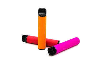 Set of colorful disposable electronic cigarettes isolated on white background. The concept of modern smoking, vaping and nicotine.	