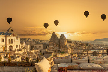 Terrace roof top morning sunrise and balloons fly at Cappadocia, Turkey.