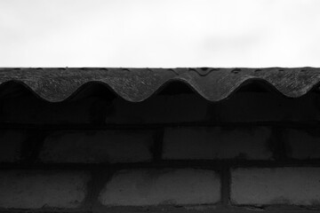 Roof slope of an old house black and white shot