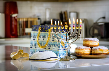 Hanukkiah menorah candles lighting Judaism tradition holiday symbols for Hanukkah celebration