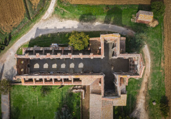 Fototapeta na wymiar Aerial view of the abbey of San Galgano: is located about 25 miles from Siena, in southern Tuscany, Italy, Siena region - September, 2022