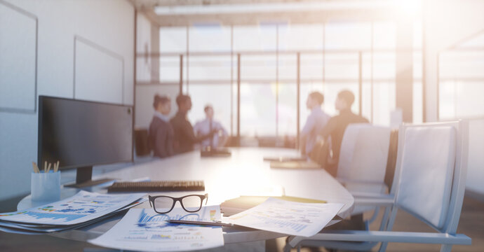 financial chart near dollars seen by unfocused glasses, colleagues meeting in office only silhouettes being viewed