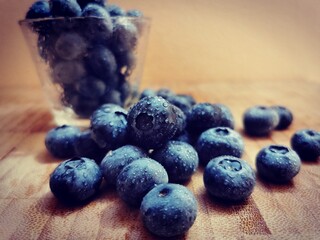 Fresh Blueberry fruits. Drops of water on organic blueberry