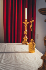 the altar in the church. Cross and candles. The concept of the Catholic Church