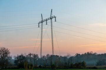 High voltage power lines at sunset.In future - scarcity of electricity. Due to high prices...