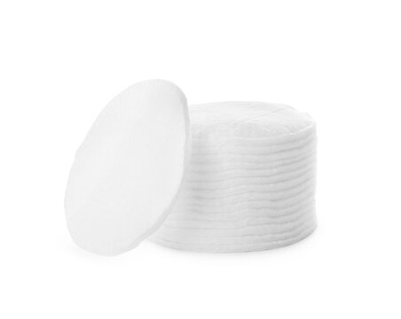 Pile of cotton pads on white background